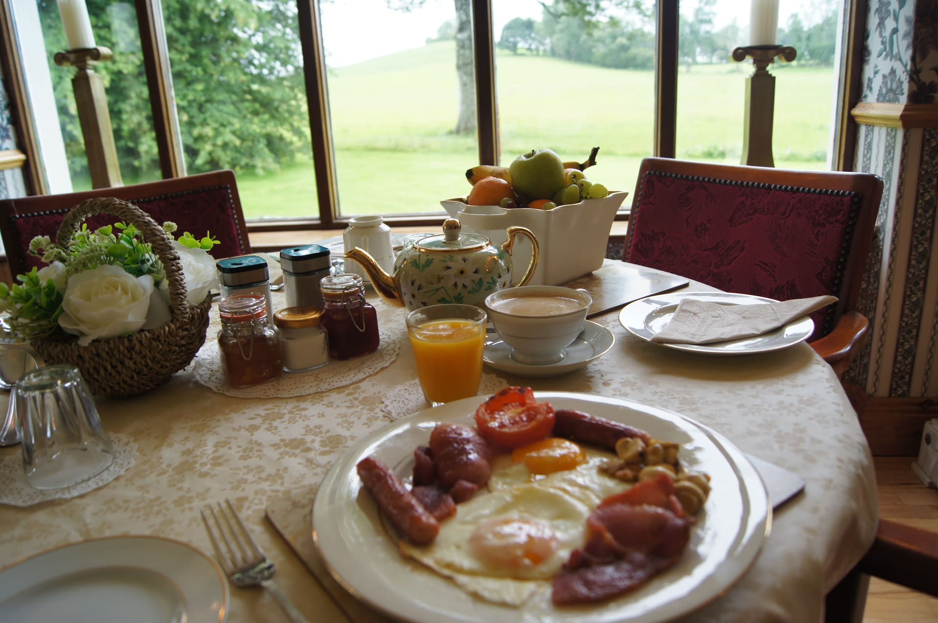Full Irish breakfast in the conservatory looking onto the fields